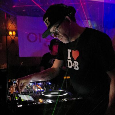 Producer D-Program deejaying at an event